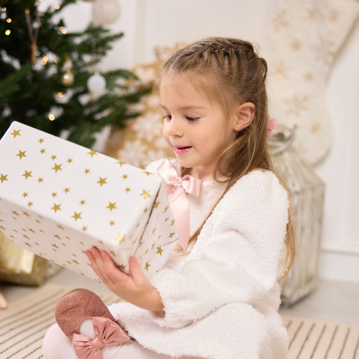 Bouclé Bow Set, sitting with present